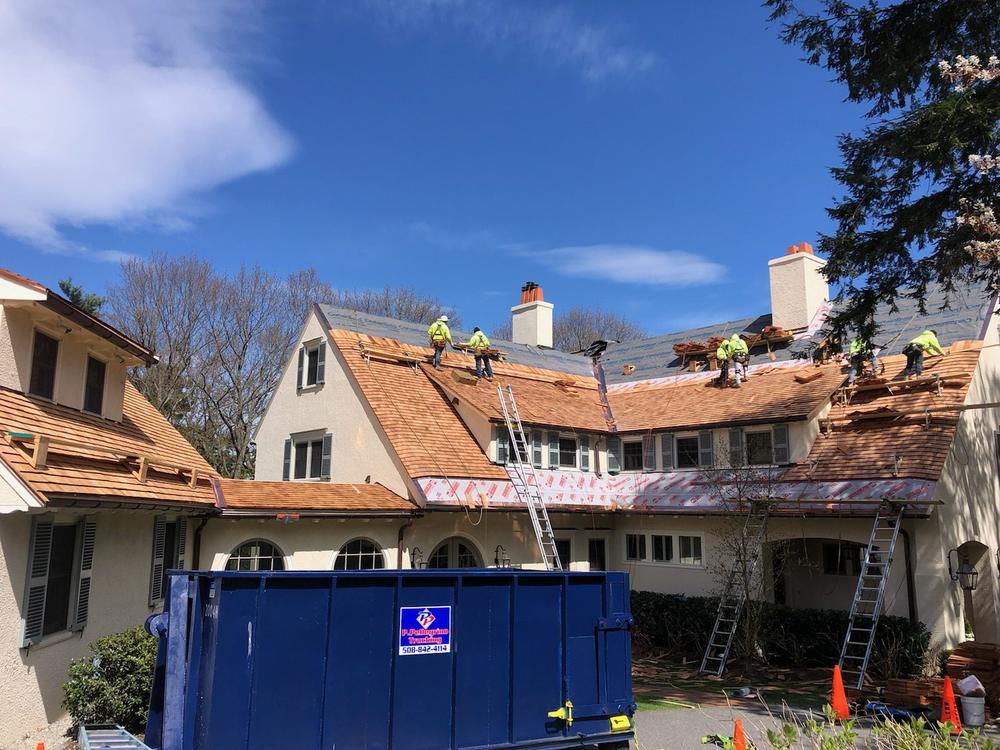Cedar shake roof restoration on a large estate