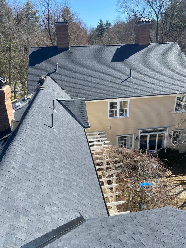 Completed shingle roof by Rocco's Roofing